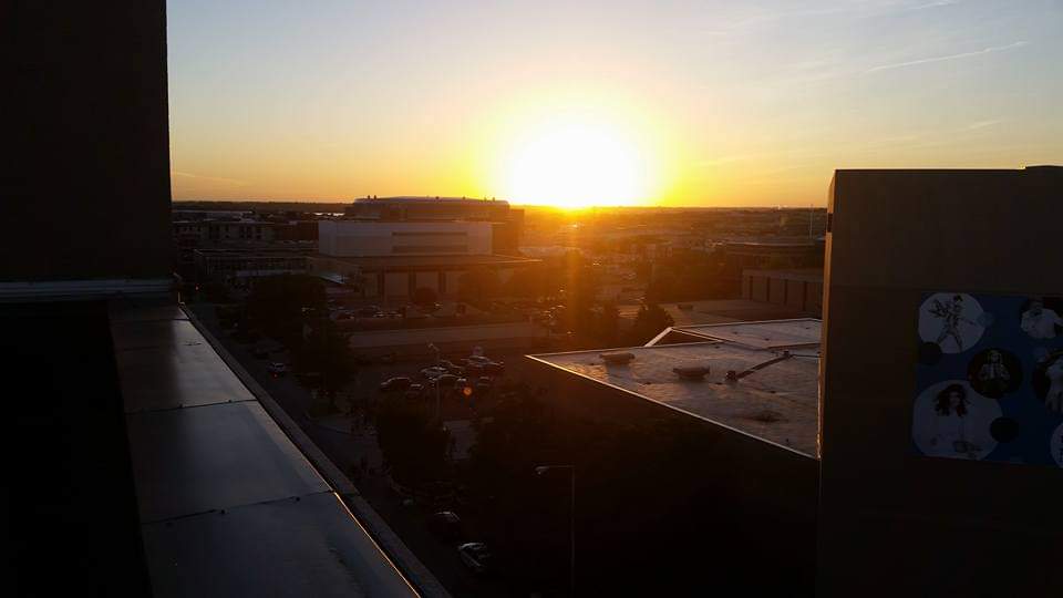 A photo of a sunset over the downtown Lincoln area.